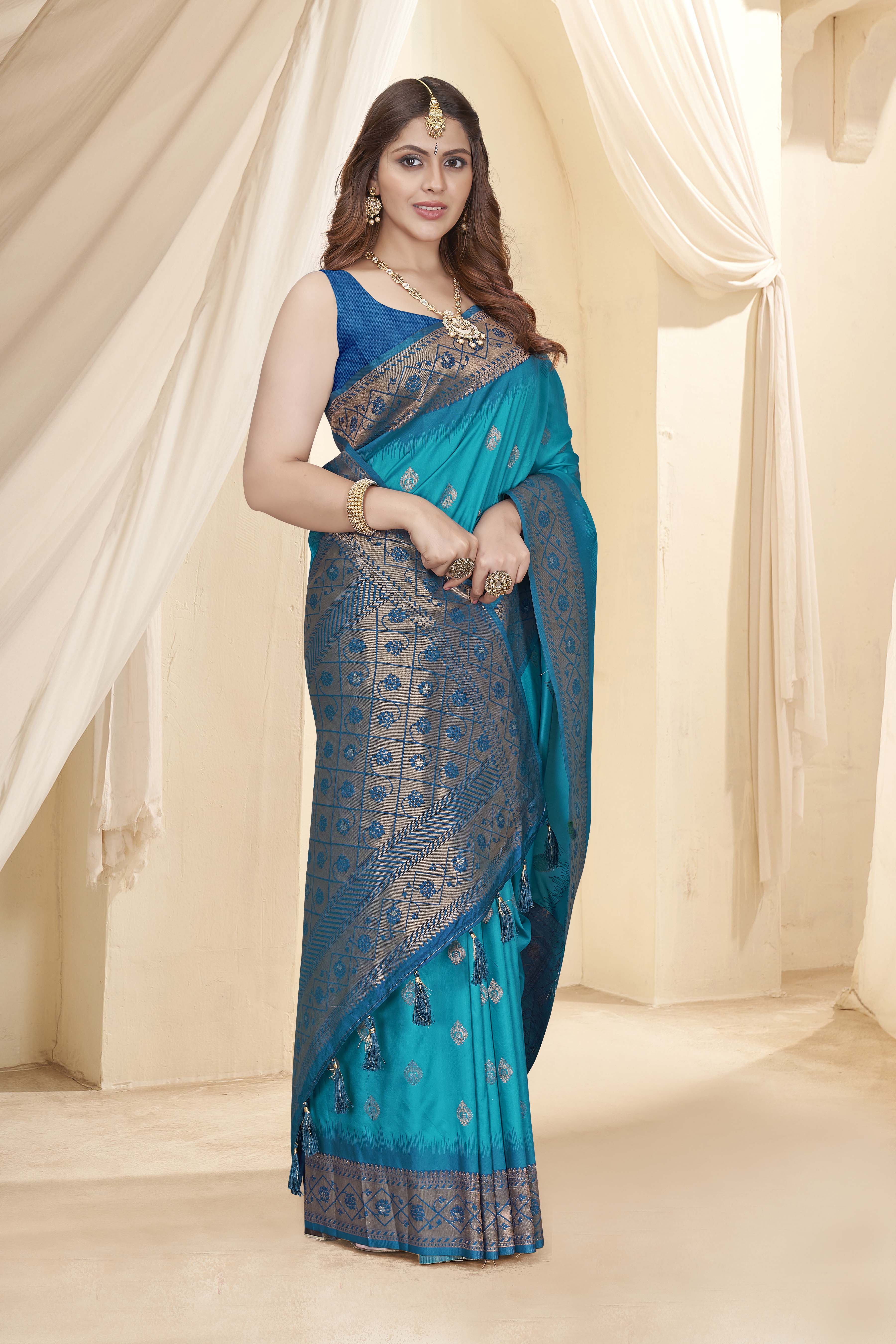Cyan Blue Soft Silk Floral Border Contrast Zari Woven Saree