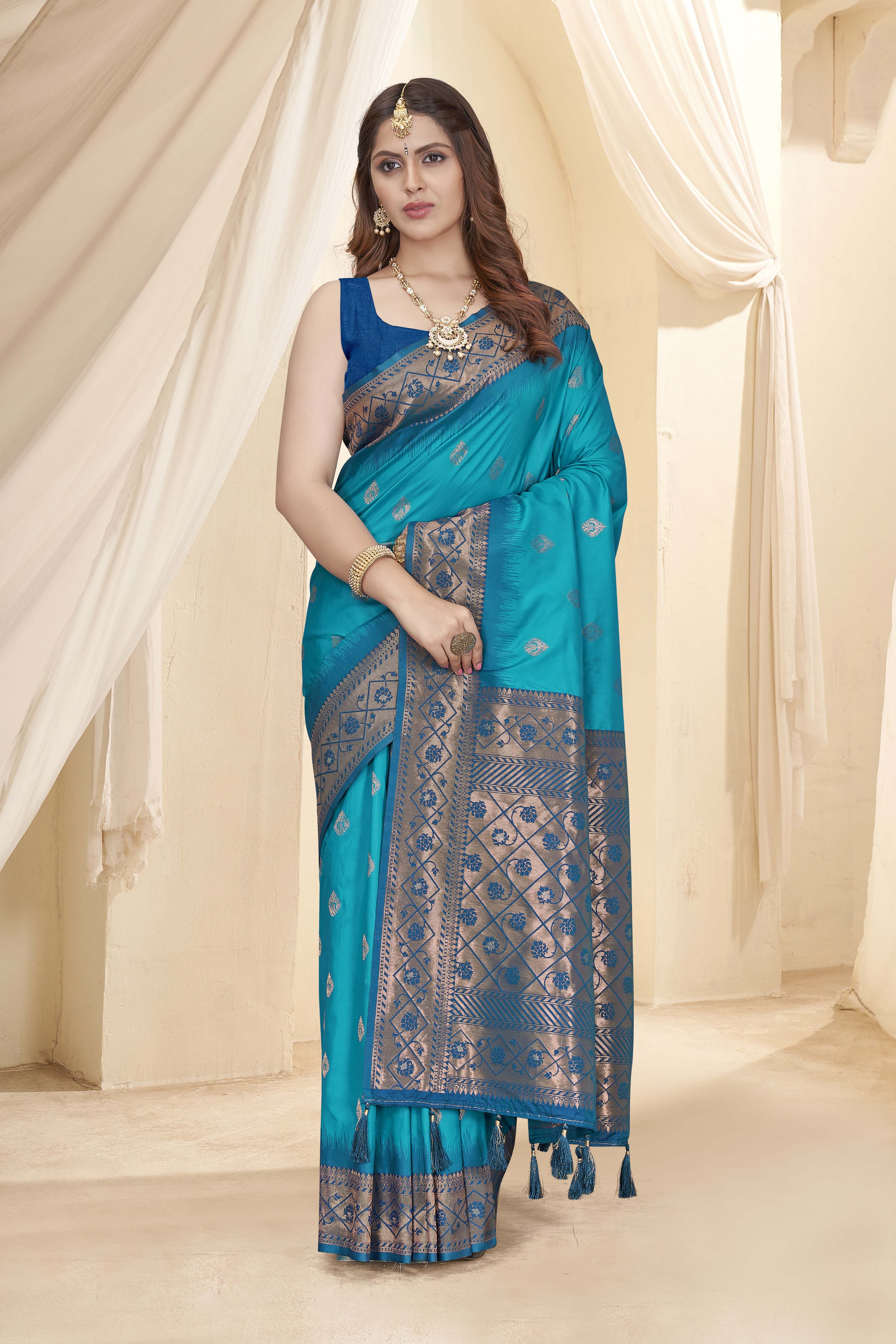 Cyan Blue Soft Silk Floral Border Contrast Zari Woven Saree