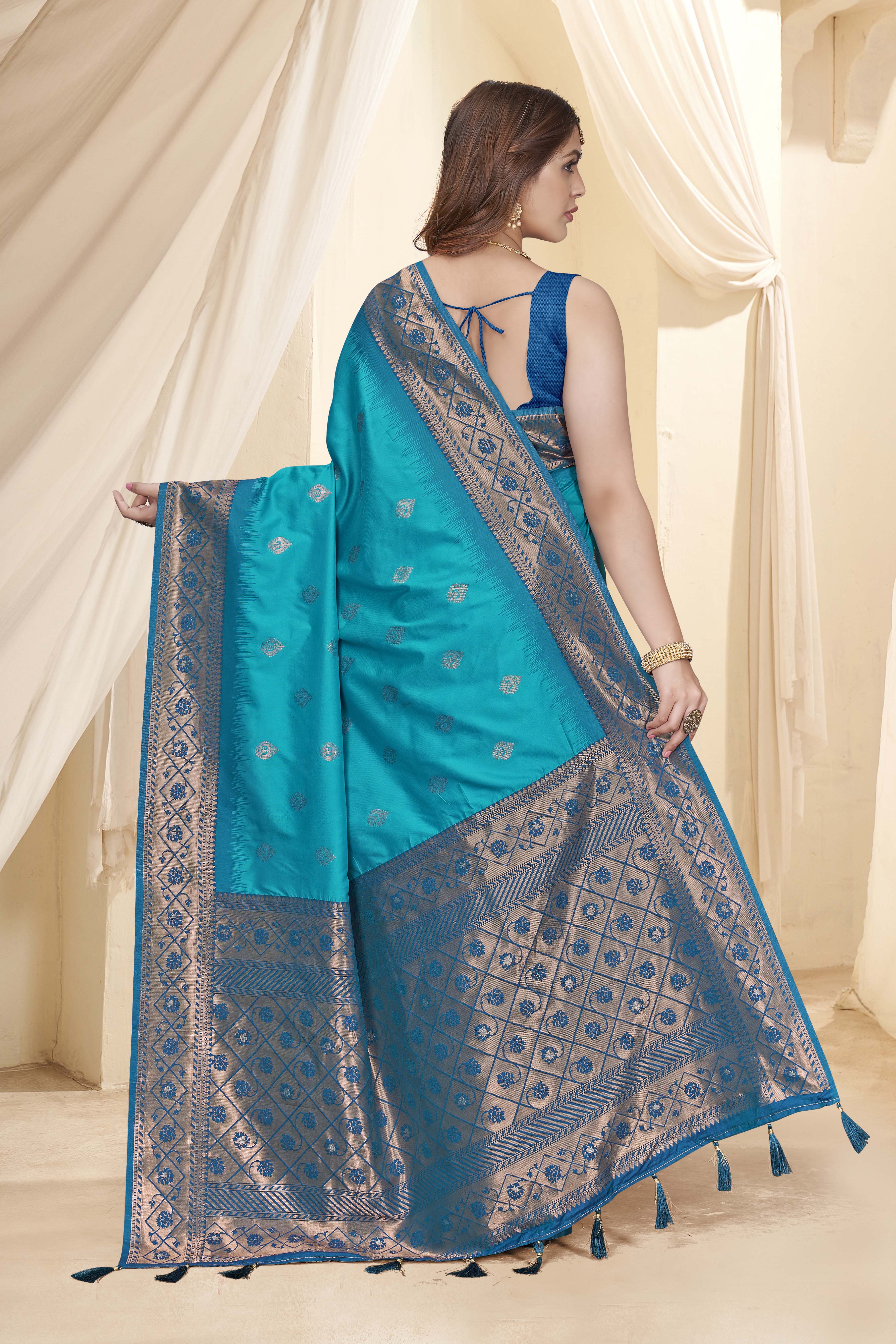 Cyan Blue Soft Silk Floral Border Contrast Zari Woven Saree