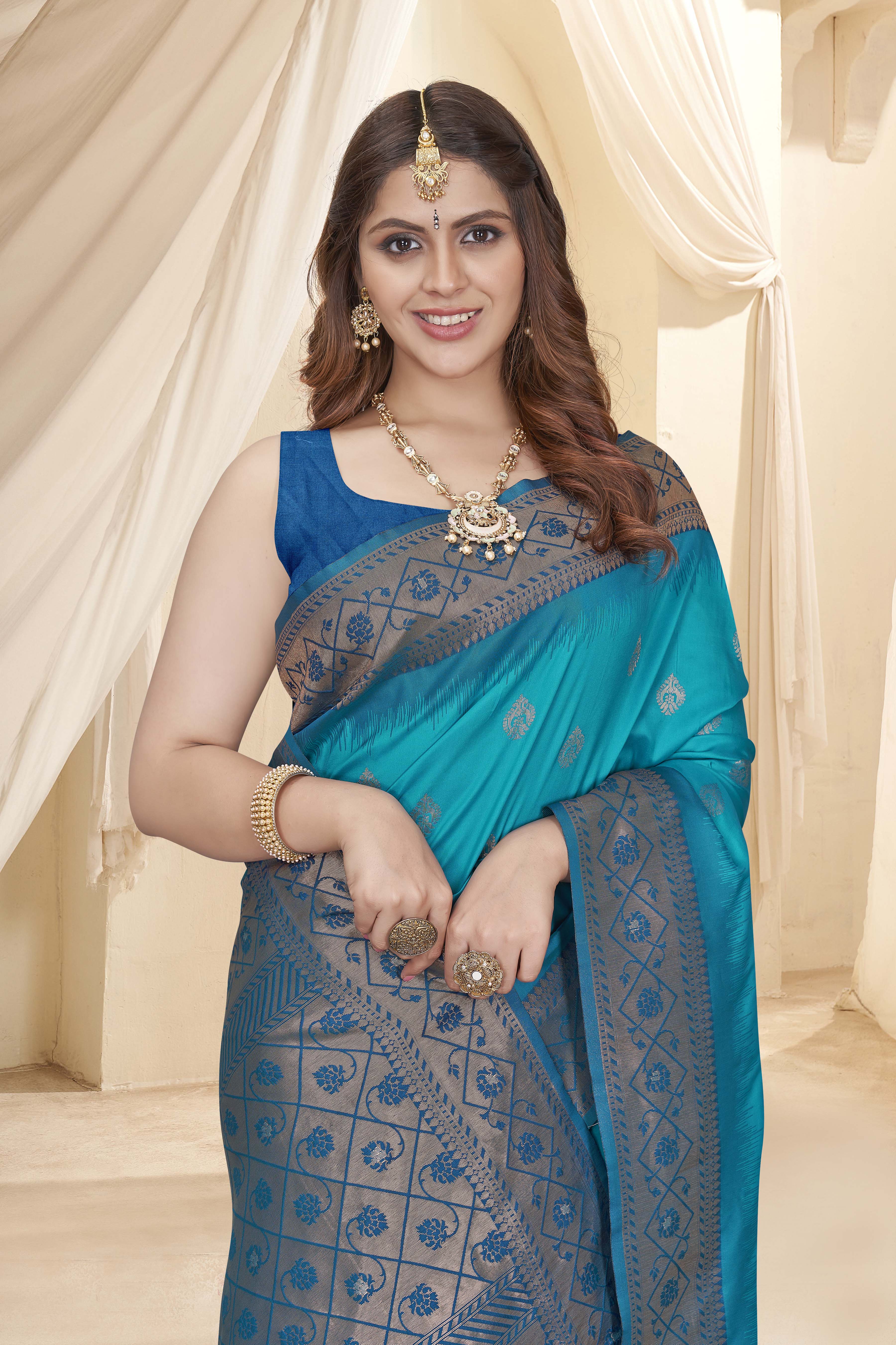 Cyan Blue Soft Silk Floral Border Contrast Zari Woven Saree