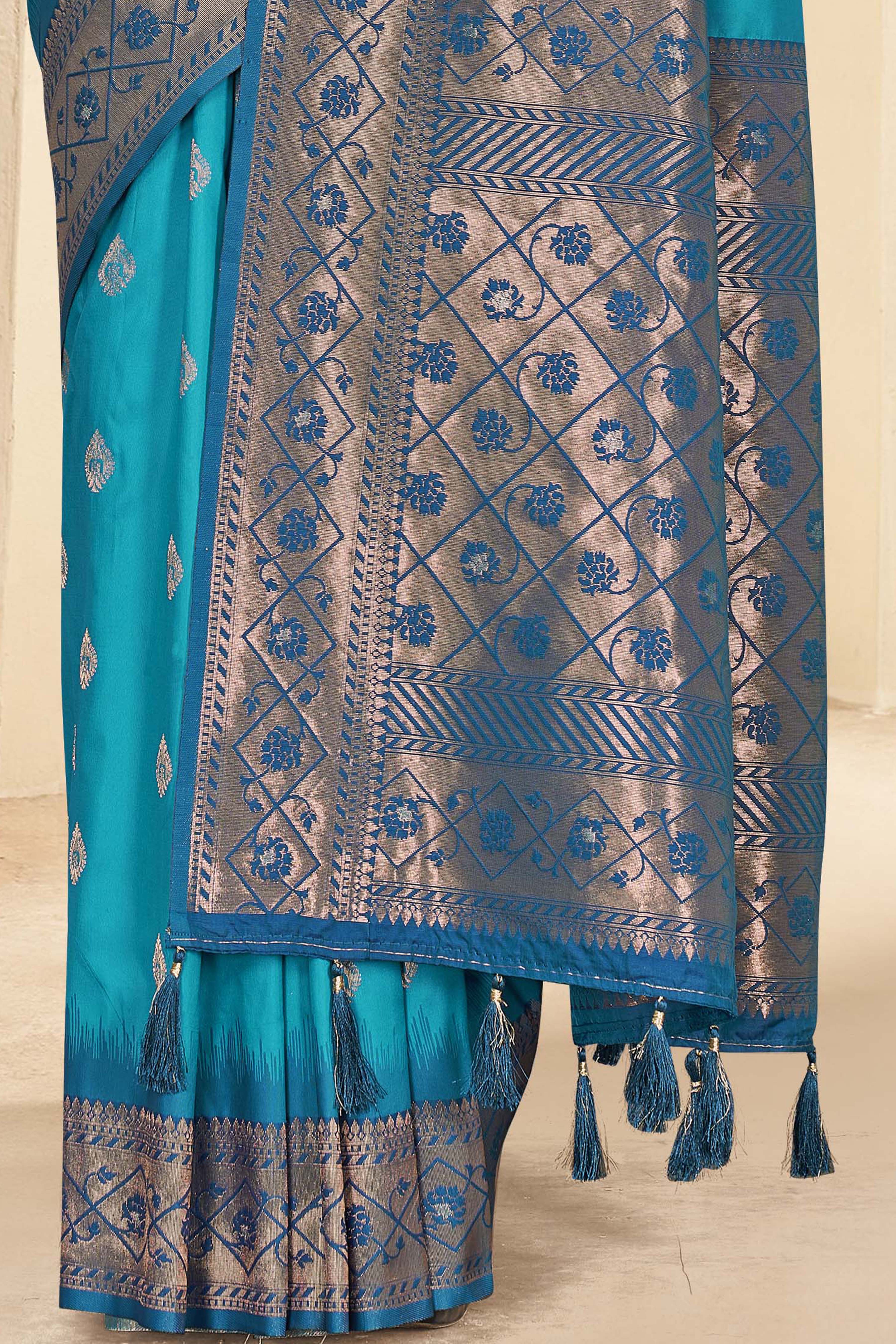 Cyan Blue Soft Silk Floral Border Contrast Zari Woven Saree