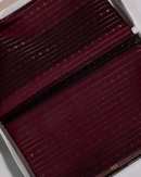 Yamika – Maroon Katan Silk Saree with Gold Zari Stripes and Leaf Motifs