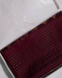 Yamika – Maroon Katan Silk Saree with Gold Zari Stripes and Leaf Motifs