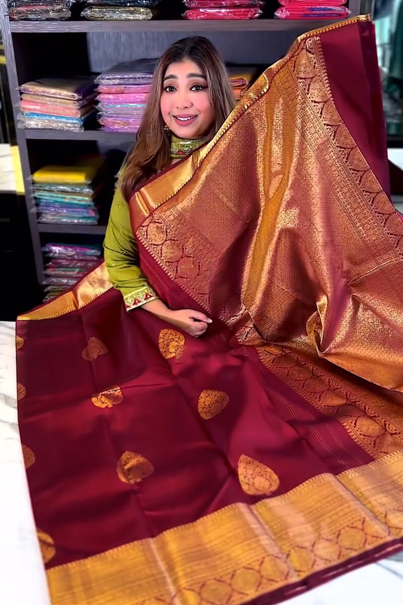Inimitable Wine Soft Banarasi Silk Saree With Evocative Blouse Piece