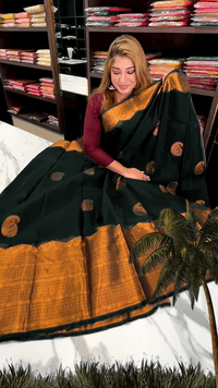 Desuetude Dark Green Soft Banarasi Silk Saree With Gorgeous Blouse Piece
