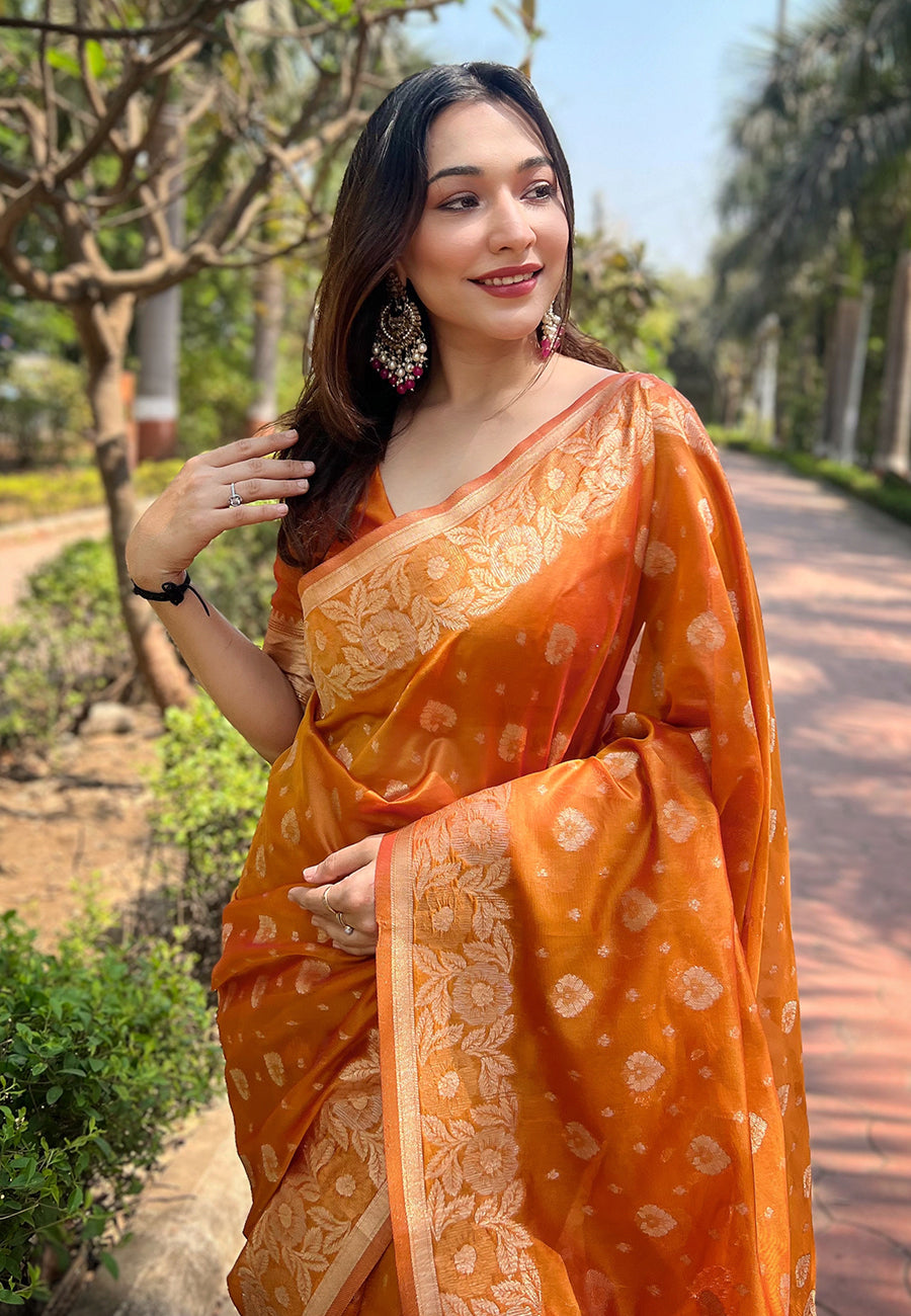 Pumpkin Orange Organza Floral Dual Zari Woven Saree With Unstitched Blouse