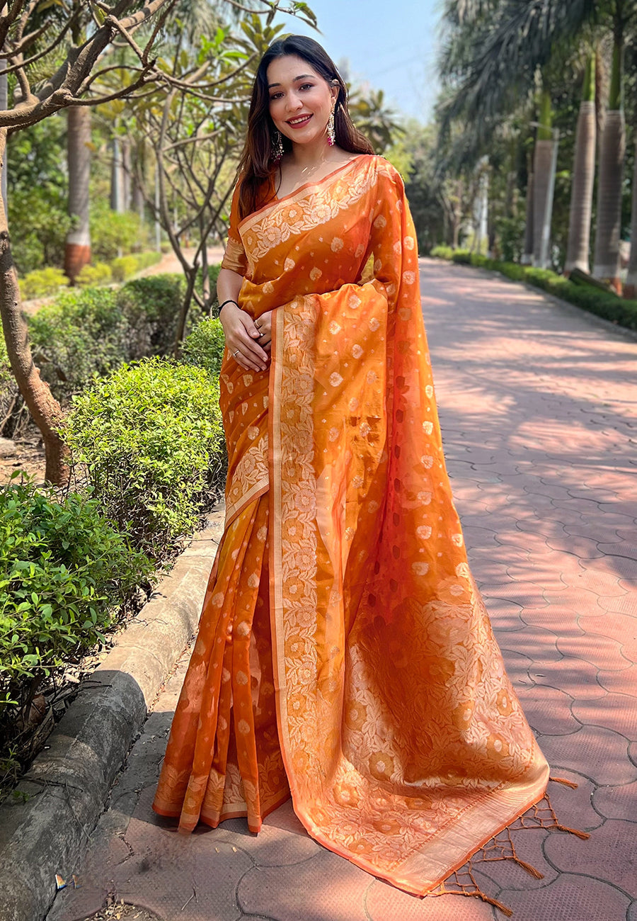 Pumpkin Orange Organza Floral Dual Zari Woven Saree With Unstitched Blouse