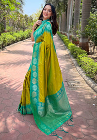 Mehendi Green Soft Silk Floral Border Zari Woven Saree