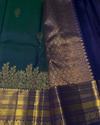 Sharvitha – Green and Navy Kanyaaram Silk Saree with Heavy Golden Zari Border and Floral Pallu