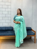 Suhani Sky Blue Chiffon Saree with Red Bandhej Blouse