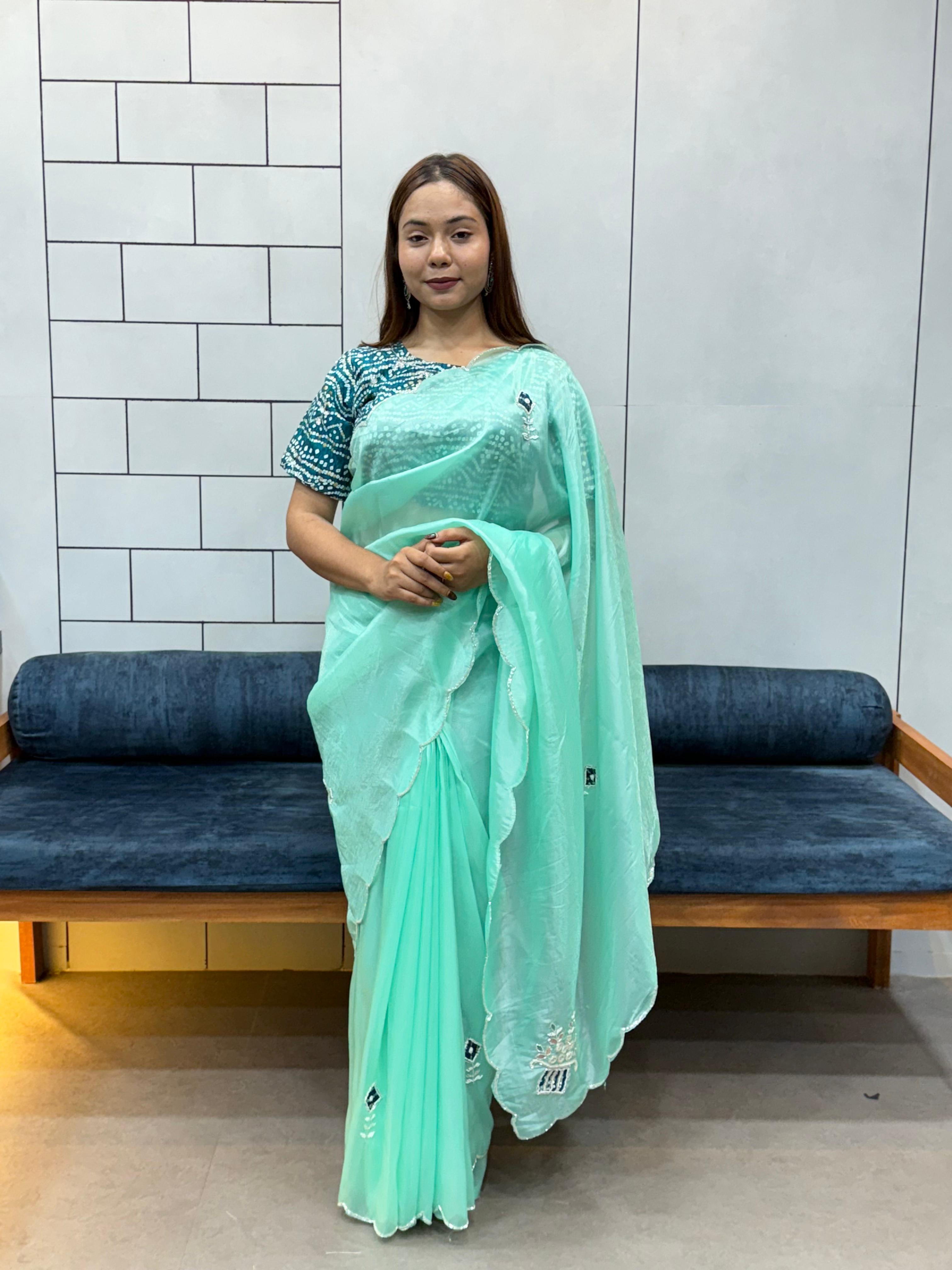 Suhani Sky Blue Chiffon Saree with Red Bandhej Blouse