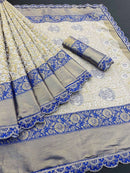 Vasundi - Beige Kanjivaram Silk Saree with Royal Blue Zari Border