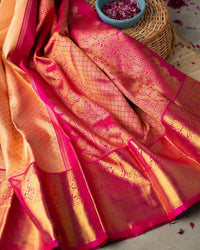 Vrishti - Peach Soft Banarasi Silk Saree with Pink Jacquard Zari Border