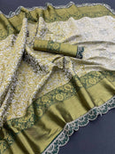 Vasundi - Green Kanjivaram Silk Saree with Royal Blue Zari Border